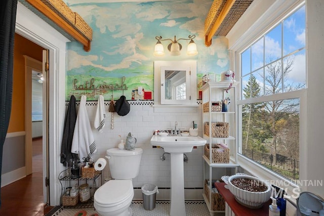 half bath featuring toilet