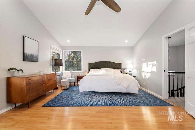 bedroom with recessed lighting, light wood-style flooring, vaulted ceiling, baseboards, and a ceiling fan