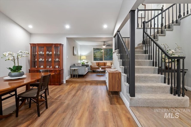 interior space featuring baseboards, recessed lighting, wood finished floors, and a ceiling fan