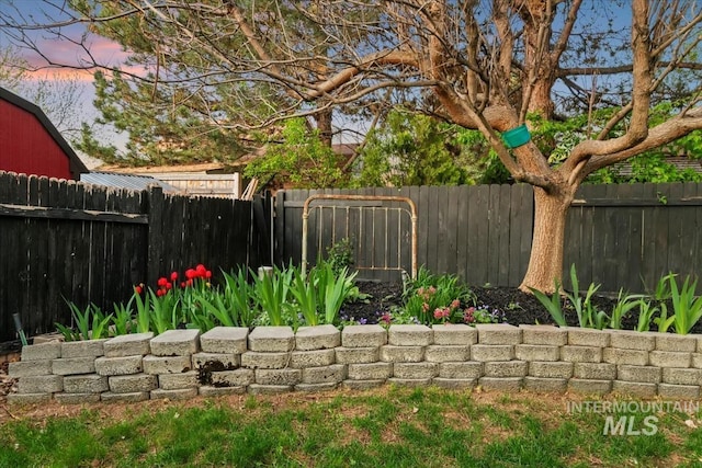yard at dusk with fence