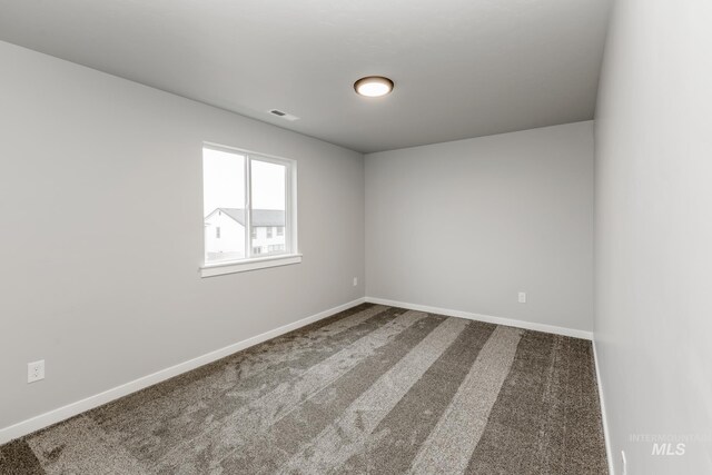 empty room with light hardwood / wood-style floors