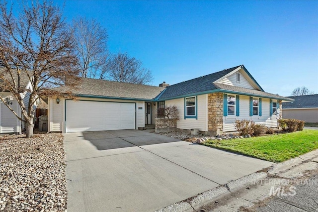 ranch-style home with a front yard and a garage