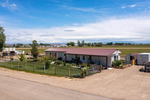 5950 Elmore Rd, New Plymouth, ID 83655 - view of front of house with metal roof and a rural view