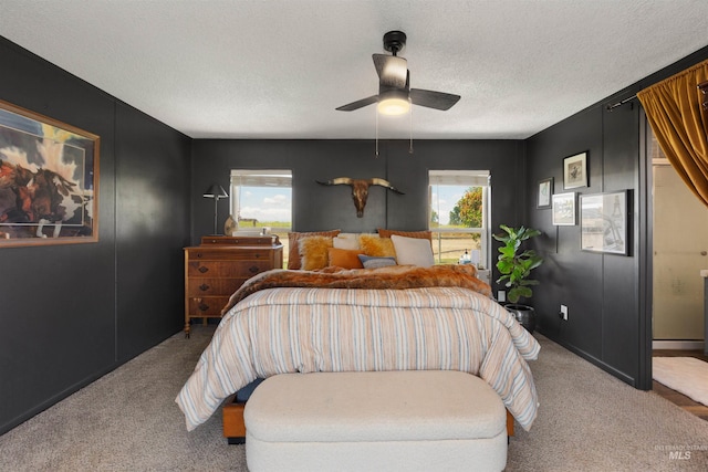 5950 Elmore Rd, New Plymouth, ID 83655 - bedroom with carpet, a ceiling fan, and a textured ceiling