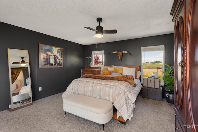 5950 Elmore Rd, New Plymouth, ID 83655 - bedroom featuring light colored carpet, a textured ceiling, and ceiling fan