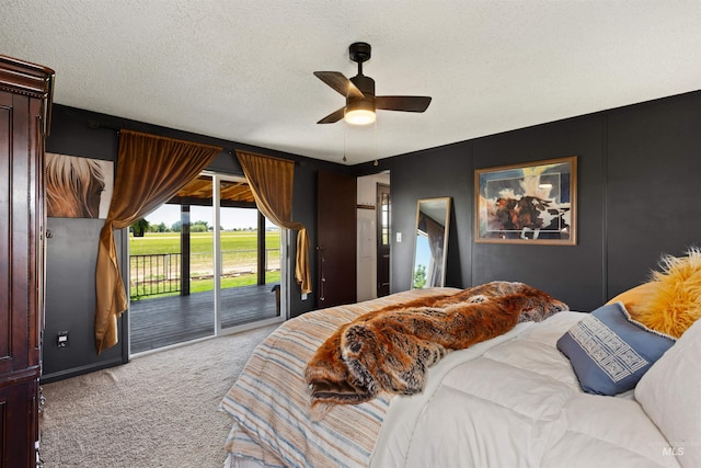 5950 Elmore Rd, New Plymouth, ID 83655 - bedroom with carpet, access to outside, a textured ceiling, and a ceiling fan