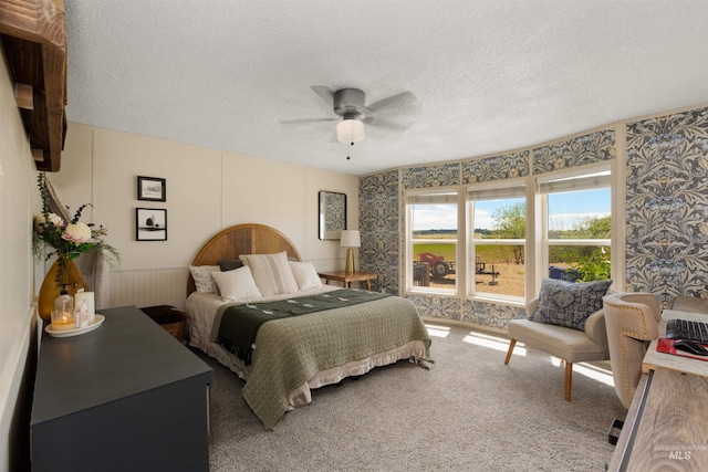 5950 Elmore Rd, New Plymouth, ID 83655 - bedroom featuring a textured ceiling, carpet, and ceiling fan