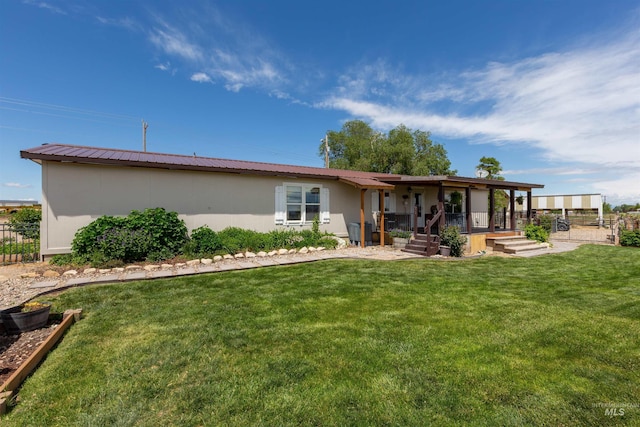 5950 Elmore Rd, New Plymouth, ID 83655 - rear view of property with a porch