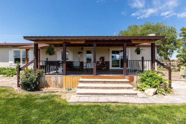 5950 Elmore Rd, New Plymouth, ID 83655 - view of front of home featuring covered porch and metal roof
