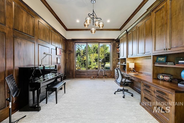 office space with built in study area, a notable chandelier, ornamental molding, light carpet, and recessed lighting
