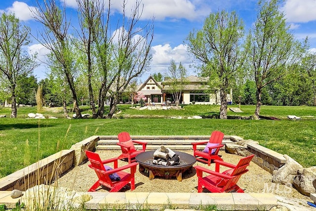 view of yard featuring a fire pit