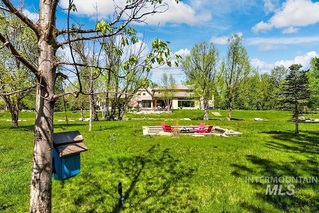 surrounding community with a yard