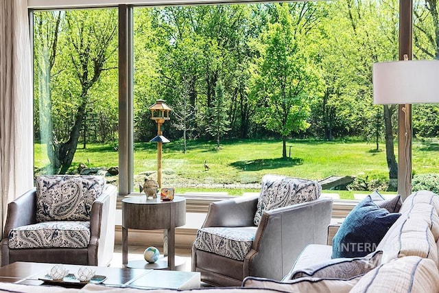view of patio / terrace featuring a forest view and outdoor lounge area
