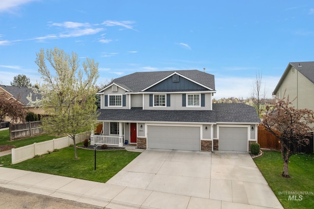 2801 W Lost Rpds, Meridian, ID 83646 - traditional home with a front yard, a shingled roof, a porch, fence, and concrete driveway