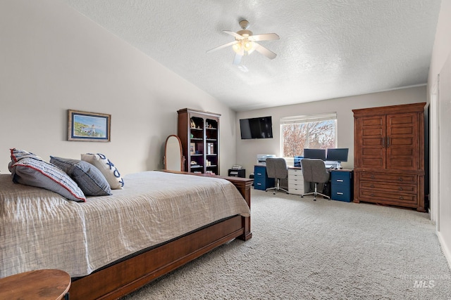 2801 W Lost Rpds, Meridian, ID 83646 - bedroom featuring carpet floors, a ceiling fan, vaulted ceiling, and a textured ceiling