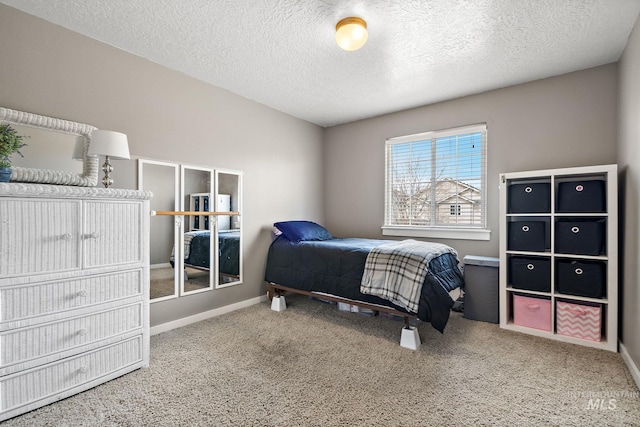 2801 W Lost Rpds, Meridian, ID 83646 - carpeted bedroom featuring baseboards and a textured ceiling