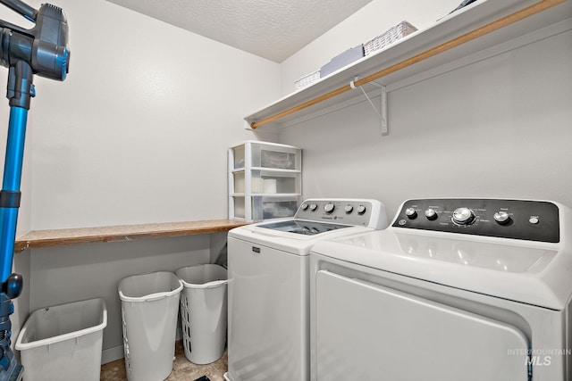2801 W Lost Rpds, Meridian, ID 83646 - laundry area featuring laundry area, washing machine and clothes dryer, and a textured ceiling