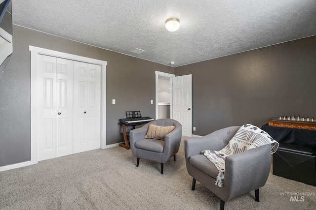 2801 W Lost Rpds, Meridian, ID 83646 - living area featuring carpet, a textured ceiling, and baseboards