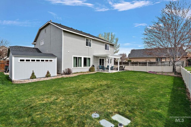 2801 W Lost Rpds, Meridian, ID 83646 - back of house featuring a yard, a patio area, a pergola, and a fenced backyard