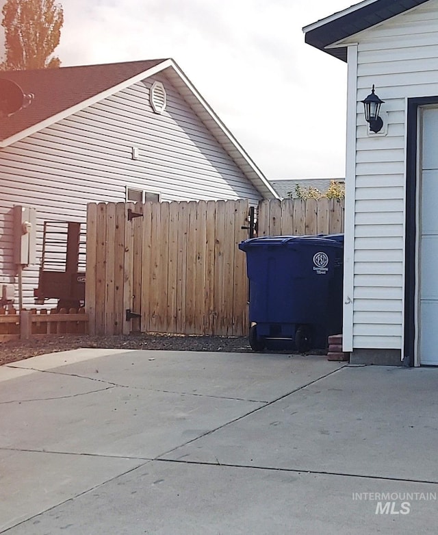 view of patio featuring fence
