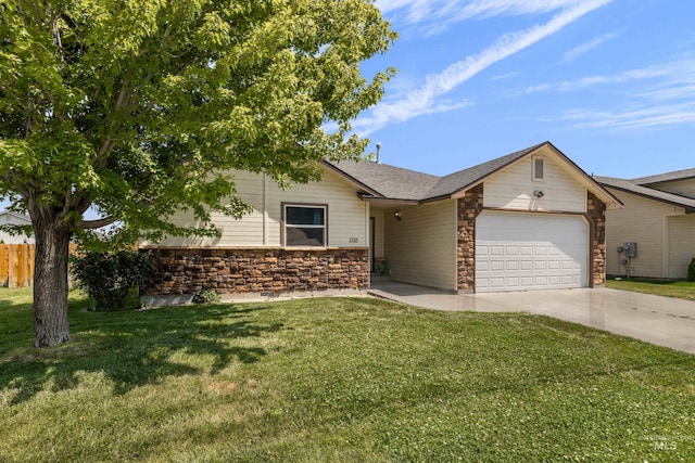 ranch-style home with a garage and a front lawn