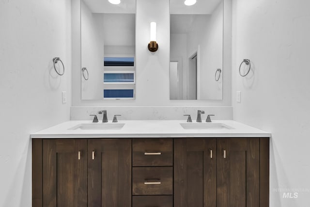 full bathroom with double vanity