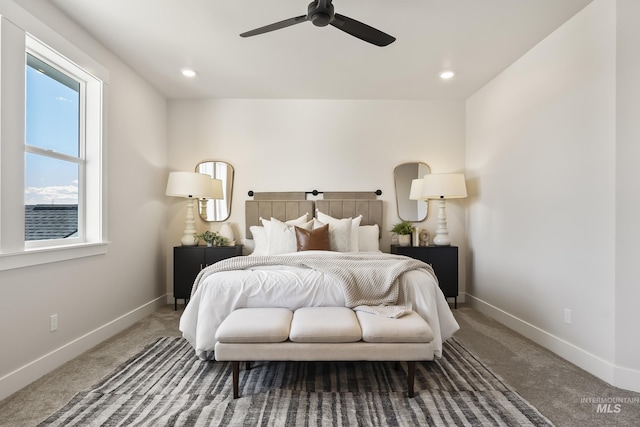 carpeted bedroom with recessed lighting and baseboards