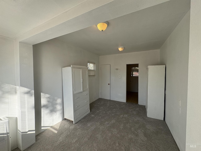 660 SW 2nd St, Ontario, OR 97914 - unfurnished bedroom with dark colored carpet