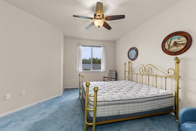 2313 River Oaks Ct, Nampa, ID 83686 - carpeted bedroom with baseboards, ceiling fan, and a textured ceiling