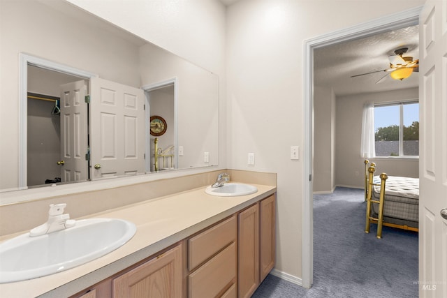 2313 River Oaks Ct, Nampa, ID 83686 - bathroom with double vanity and baseboards