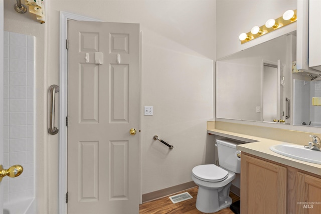 2313 River Oaks Ct, Nampa, ID 83686 - full bath featuring vanity, toilet, wood finished floors, and shower / bath combination
