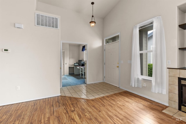 2313 River Oaks Ct, Nampa, ID 83686 - entrance foyer featuring wood finished floors, a high ceiling, and baseboards