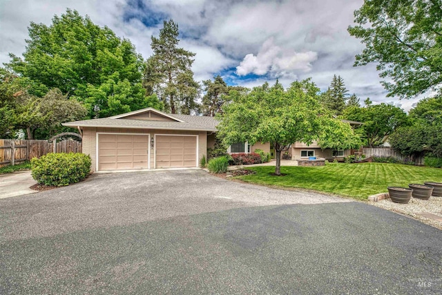 6174 W Winstead Pl, Boise, ID 83704 - view of front of house featuring asphalt driveway and an attached garage