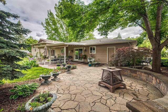 6174 W Winstead Pl, Boise, ID 83704 - back of house with a patio area