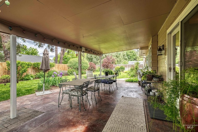 6174 W Winstead Pl, Boise, ID 83704 - view of patio featuring outdoor dining area and a fenced backyard