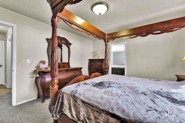 11793 Shelburne, Caldwell, ID 83605 - bedroom featuring baseboards, ensuite bath, a textured ceiling, and carpet