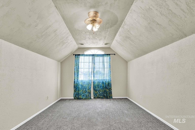 11793 Shelburne, Caldwell, ID 83605 - additional living space featuring a textured wall, carpet flooring, and vaulted ceiling