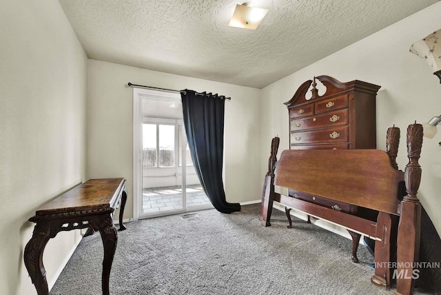 11793 Shelburne, Caldwell, ID 83605 - office with baseboards, visible vents, a textured ceiling, and carpet flooring