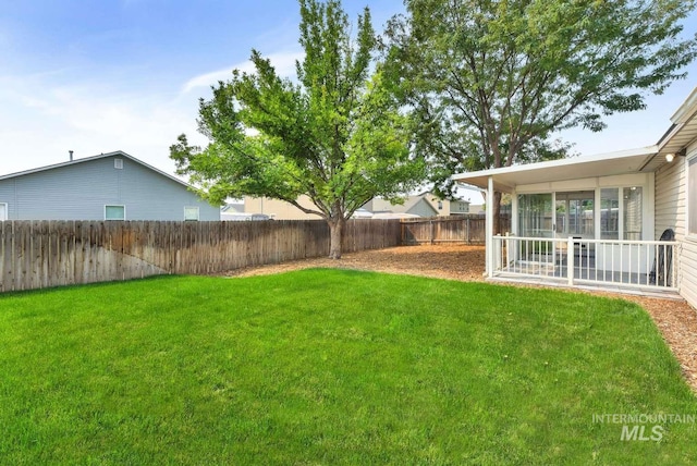 11793 Shelburne, Caldwell, ID 83605 - view of yard with a sunroom and a fenced backyard