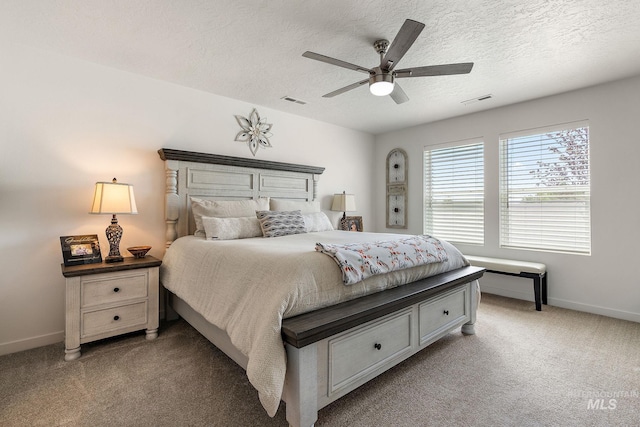 2701 N Ice Fire Pl, Star, ID 83669 - bedroom featuring baseboards, light carpet, a textured ceiling, and ceiling fan