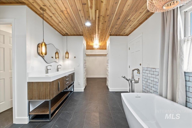 905 S Canyon St, Nampa, ID 83686 - full bath featuring wooden ceiling, a soaking tub, vanity, and a spacious closet