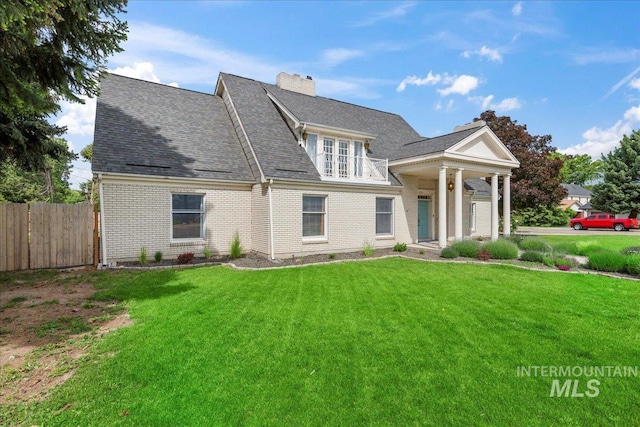905 S Canyon St, Nampa, ID 83686 - view of front of house featuring brick siding and a shingled roof