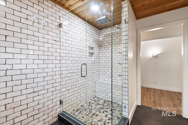 905 S Canyon St, Nampa, ID 83686 - full bathroom with a stall shower, wood ceiling, baseboards, and tile patterned flooring