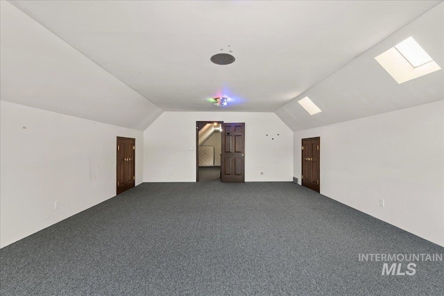 905 S Canyon St, Nampa, ID 83686 - bonus room featuring lofted ceiling, dark colored carpet, and a skylight