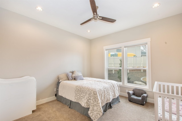 14050 Hidalgo Ranch Pl, Nampa, ID 83651 - bedroom featuring baseboards, light carpet, a ceiling fan, and recessed lighting