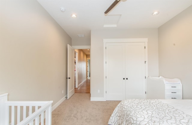 14050 Hidalgo Ranch Pl, Nampa, ID 83651 - bedroom with a ceiling fan, light colored carpet, baseboards, a closet, and recessed lighting