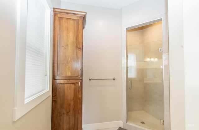 14050 Hidalgo Ranch Pl, Nampa, ID 83651 - full bathroom with baseboards and a shower stall