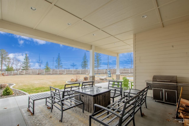14050 Hidalgo Ranch Pl, Nampa, ID 83651 - view of patio / terrace with fence, a grill, and an outdoor fire pit