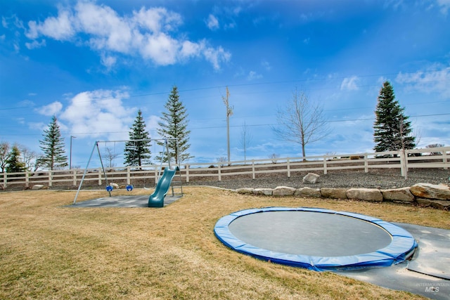 14050 Hidalgo Ranch Pl, Nampa, ID 83651 - surrounding community featuring a fenced backyard, a trampoline, a playground, and a yard