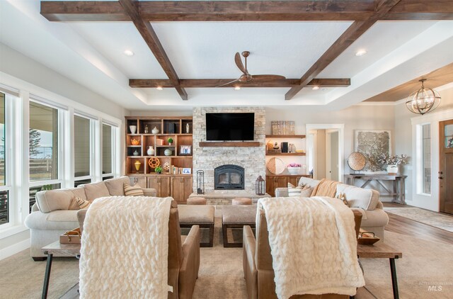 14050 Hidalgo Ranch Pl, Nampa, ID 83651 - living room with a stone fireplace, beamed ceiling, a notable chandelier, coffered ceiling, and recessed lighting